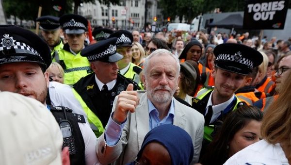 Labour Party leader, Jeremy Corbyn, leaves after addressing an anti-austerity rally in Parliament Square, London, UK, July 1, 2017