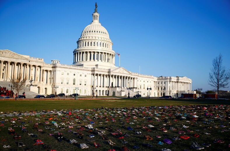 7,000 unfilled children's shoes to commemorate the children killed by gunfire since the 2012 Sandy Hook massacre.
