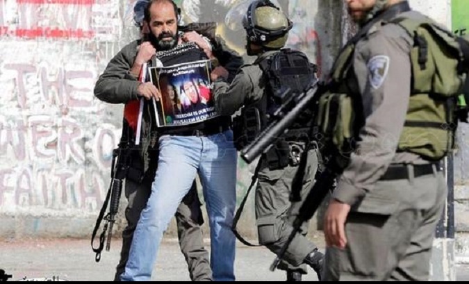 Munther Amira arrested during protest in Bethlehem.