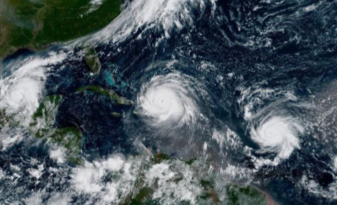 Hurricane Irma, Hurricane Jose (R) and Hurricane Katia (L) are pictured in the Atlantic Ocean.