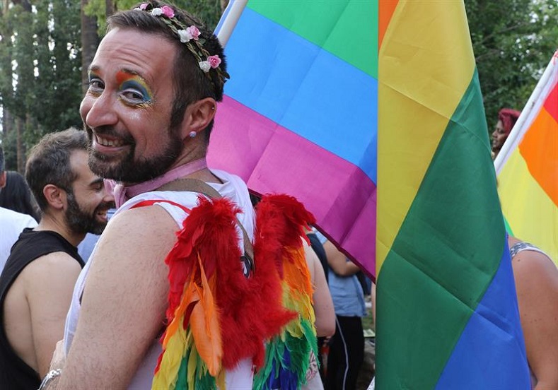 A man with a rainbow flag during the Cyprus Pride Parade in Nicosia, Cyprus, 03 June 2018. The parade was held as part of the LGBT (lesbian, gay, bisexual and transgender) community's Gay Pride Festival.