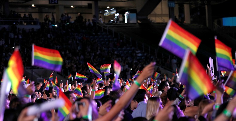 People wave flags to celebrate Pride month during Wango Tango concert at Banc of California Stadium in Los Angeles, California, U.S., June 2, 2018.