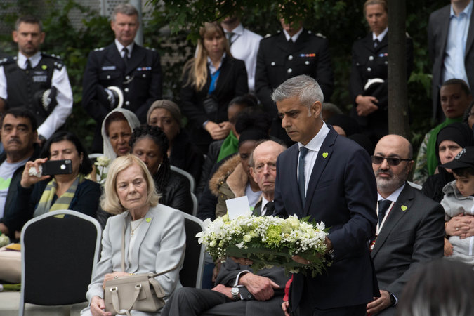 London Mayor Sadiq Khan was one of many who shook hands with firefighters who lined up to pay their respects midway through the walk.