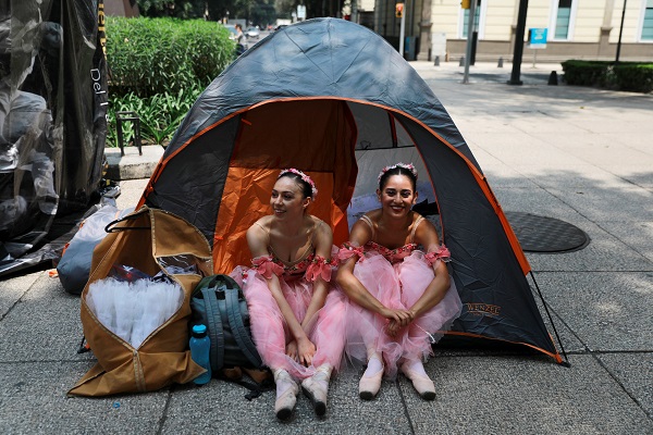 Classically trained ballerinas from Mexico's most respected dance company camped out in tents on the pavement between shows.