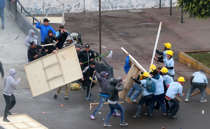 Alianza Lima's soccer fans and Evangelical Christians clash over a land dispute at the Alejandro Villanueva stadium, Lima, Peru September 10, 2018
