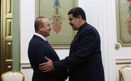 Turkish Foreign Minister Mevlut Cavusoglu meets with Venezuelan President Nicolas Maduro in Caracas.
