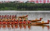 Celebran carreras de botes del dragón en Miluo, China