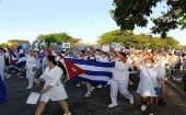 Trabajadores cubanos se movilizan para participar en actos por el Día Internacional de los Trabajadores.