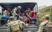 Agentes militares trasladan a las personas desplazadas a sus comunidades en el sur del estado de Chiapas.