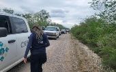 Funcionarios de la CNB colaboran en la búsqueda de dos personas desaparecidas en el estado mexicano de Nuevo León.